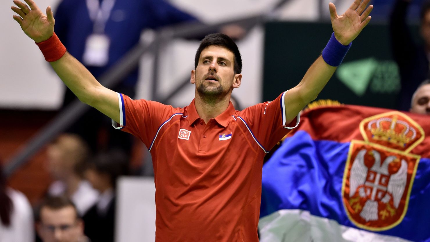 An exhausted Novak Djokovic reacts after beating Kazakhstan's Mikhail Kukushkin in a marathon five-set Davis Cup rubber in Belgrade.