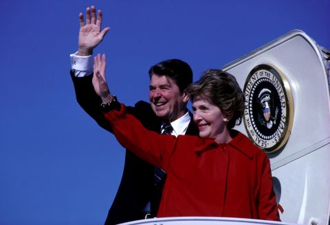 First lady Nancy Reagan stands next to her husband, President Ronald Reagan, as they wave from the steps of Air Force One in December 1981. The first lady died at her home in Los Angeles of congestive heart failure, according to her spokeswoman, Joanne Drake of the Ronald Reagan Presidential Library. She was 94.