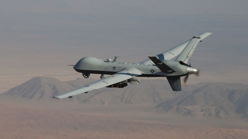 An MQ-9 Reaper, armed with GBU-12 Paveway II laser guided munitions and AGM-114 Hellfire missiles, piloted by Col. Lex Turner flies a combat mission over southern Afghanistan. (U.S. Air Force Photo / Lt. Col. Leslie Pratt)