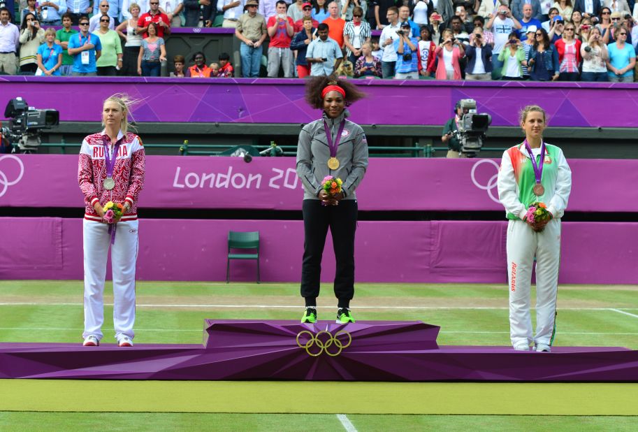 Sharapova, left, at the London 2012 Olympic medal ceremony at Wimbledon with Serena Williams, center, and Victoria Azarenka. Sharapova finished with the silver after losing to Williams in the final.