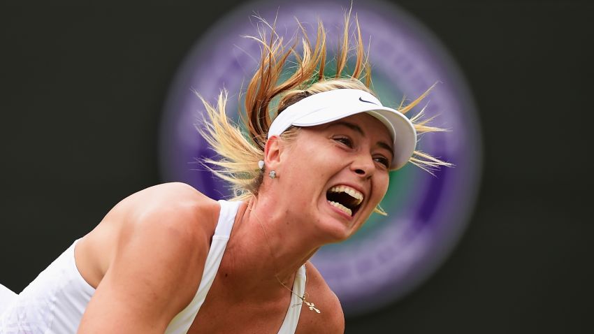 Maria Sharapova of Russia serves in her Ladies' Singles Fourth Round match against Zarina Diyas of Kazakhstan during day seven of the Wimbledon Lawn Tennis Championships at the All England Lawn Tennis and Croquet Club on July 6, 2015 in London, England.  