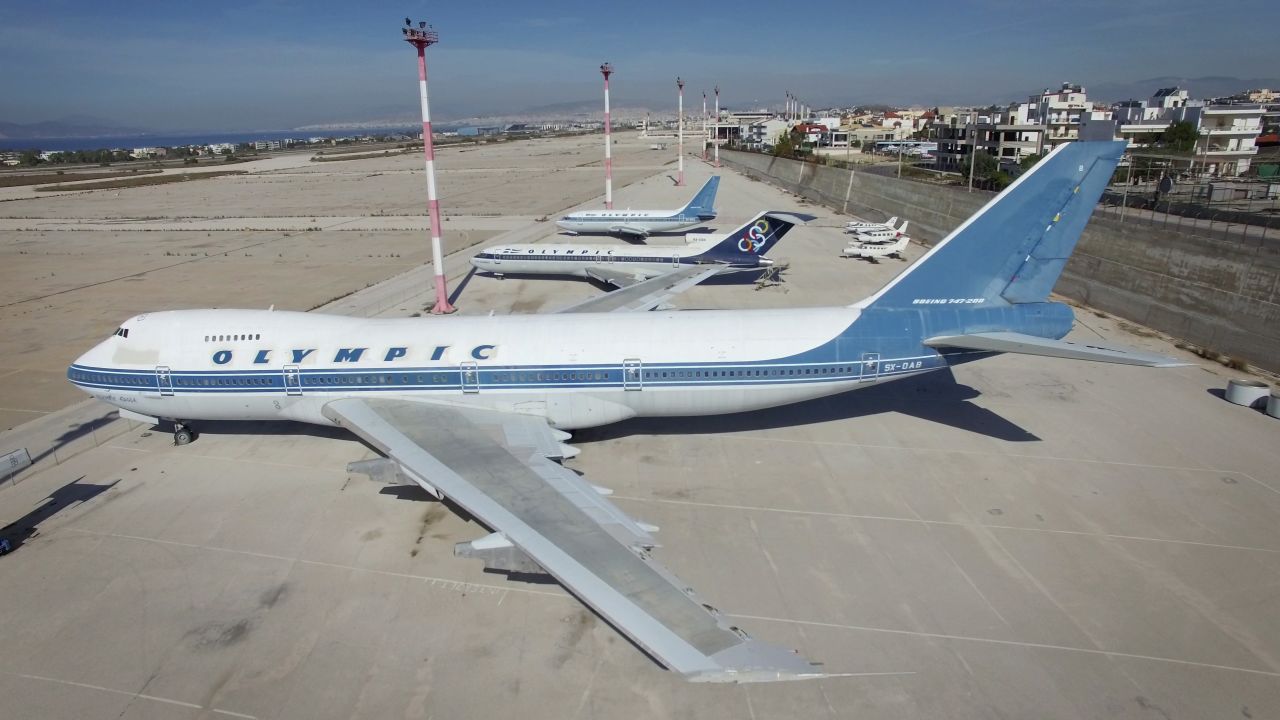 Old planes sit in an abandoned airport that is being used to house migrants in Athens, Greece. 5th March 2016