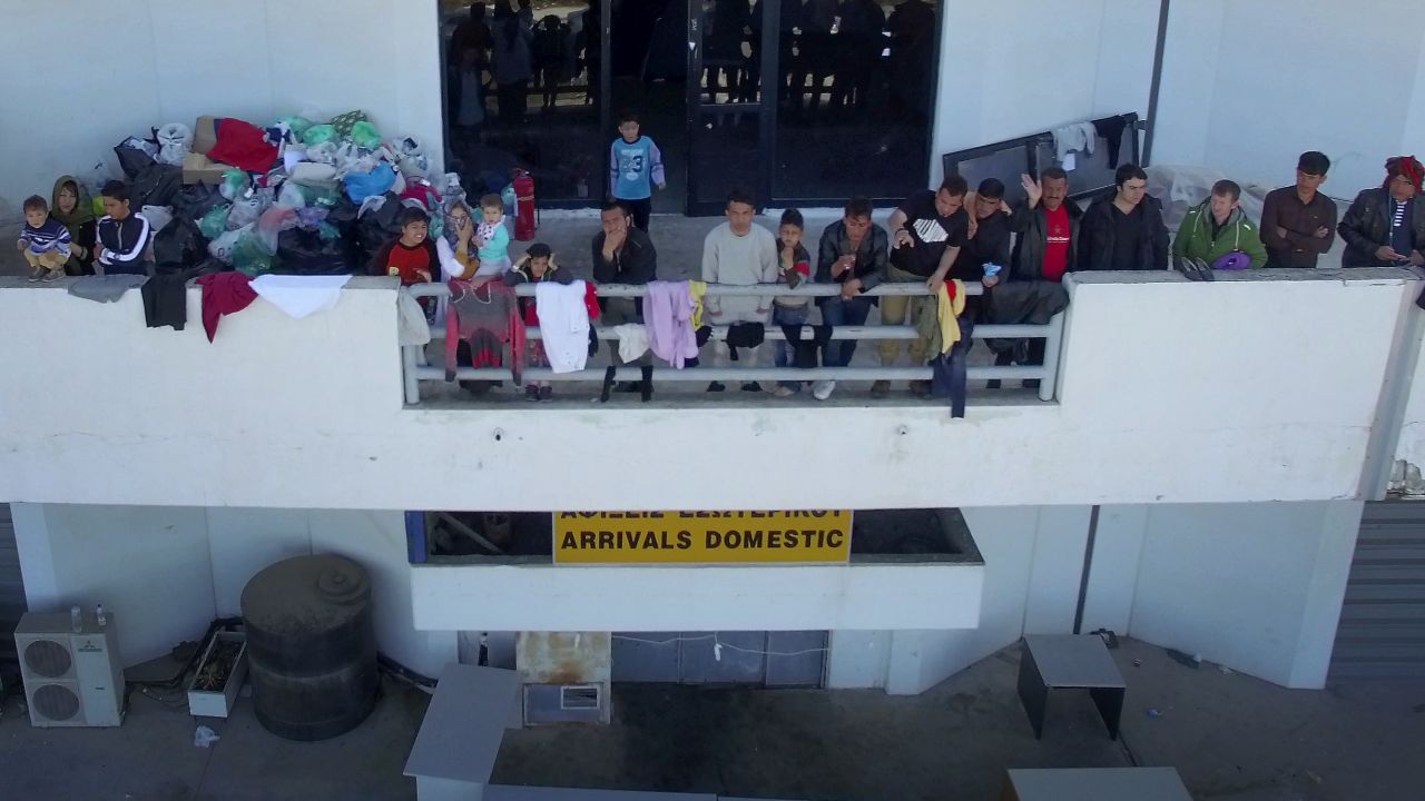 migrants hellinikon airport balcony