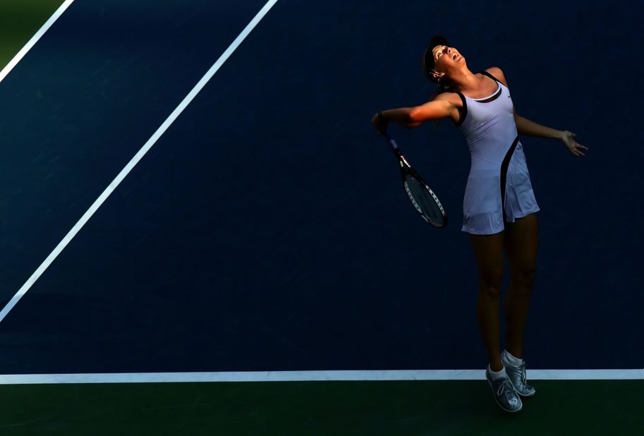 Sharapova serves during the 2006 U.S. Open semifinals. She advanced to beat Justine Henin in the final. It was her second Grand Slam title.