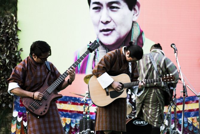 Bhutanese musicians play at a music festival on the outskirts of the capital as part of the country-wide celebration of the 60th birthday of the fourth king.