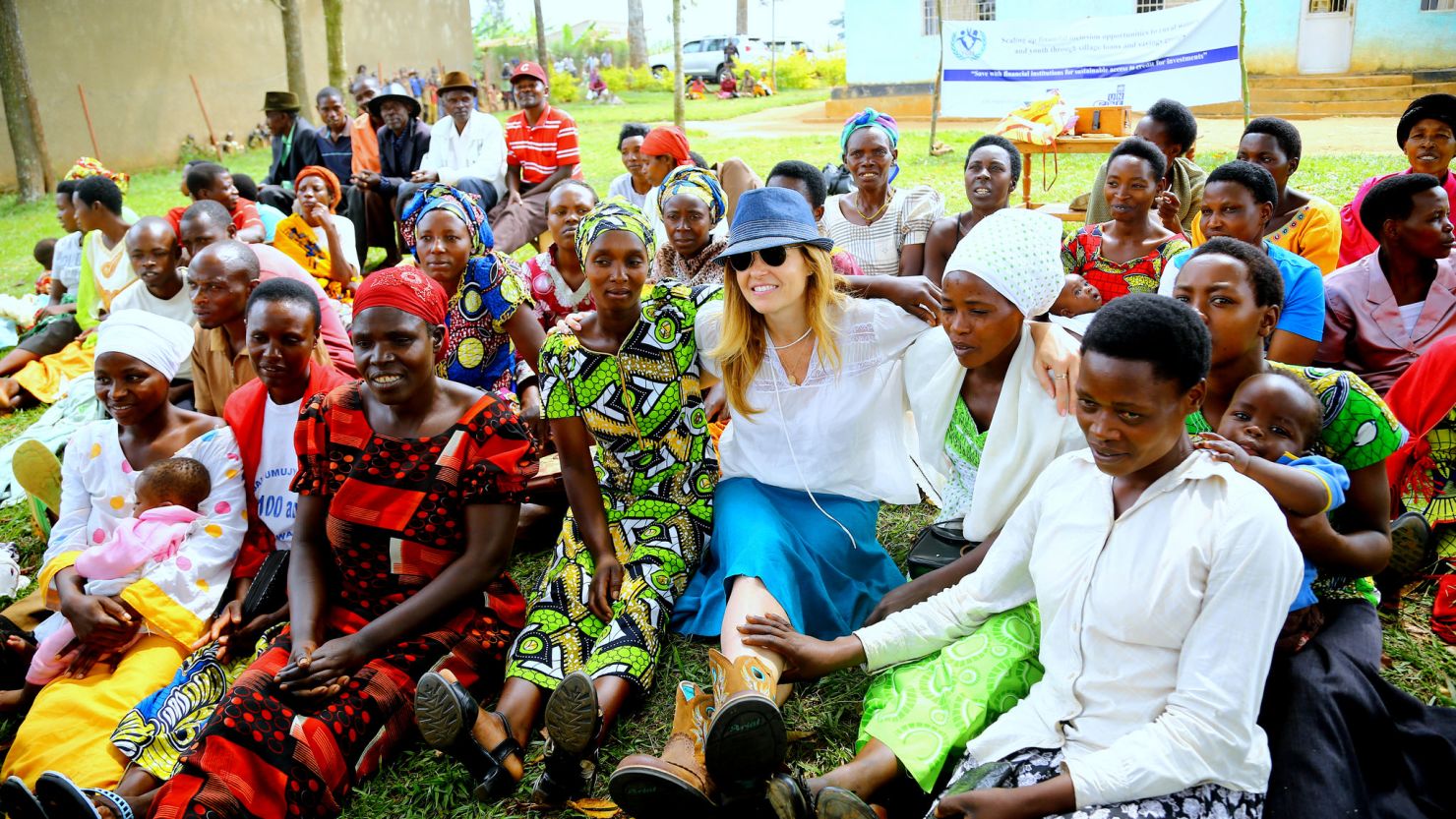 UNDP Goodwill Ambassador Connie Britton visits with women in Rwanda in June 2015.