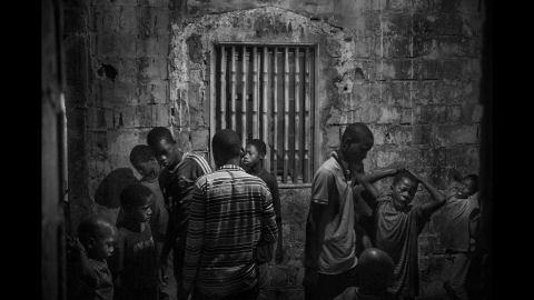Talibés wake up in Diamaguene, Senegal. Cruz said 30 children between the ages of 5 and 16 sleep here.