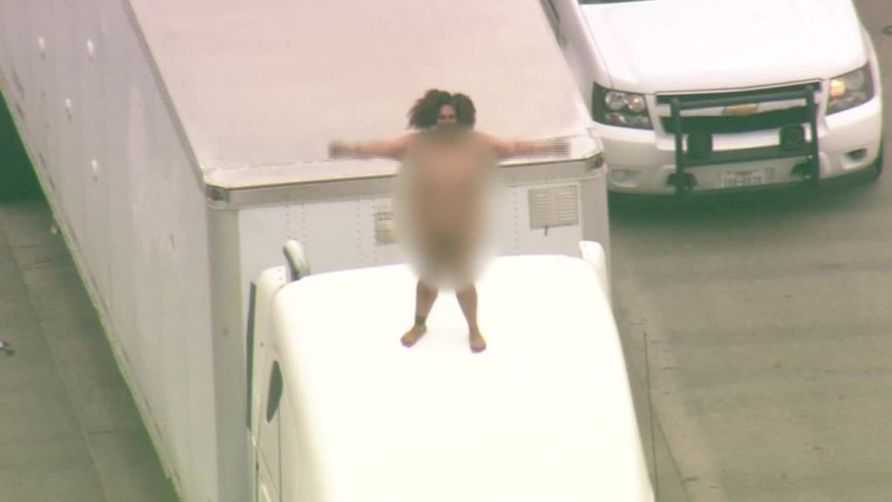 Naked woman causes traffic jam