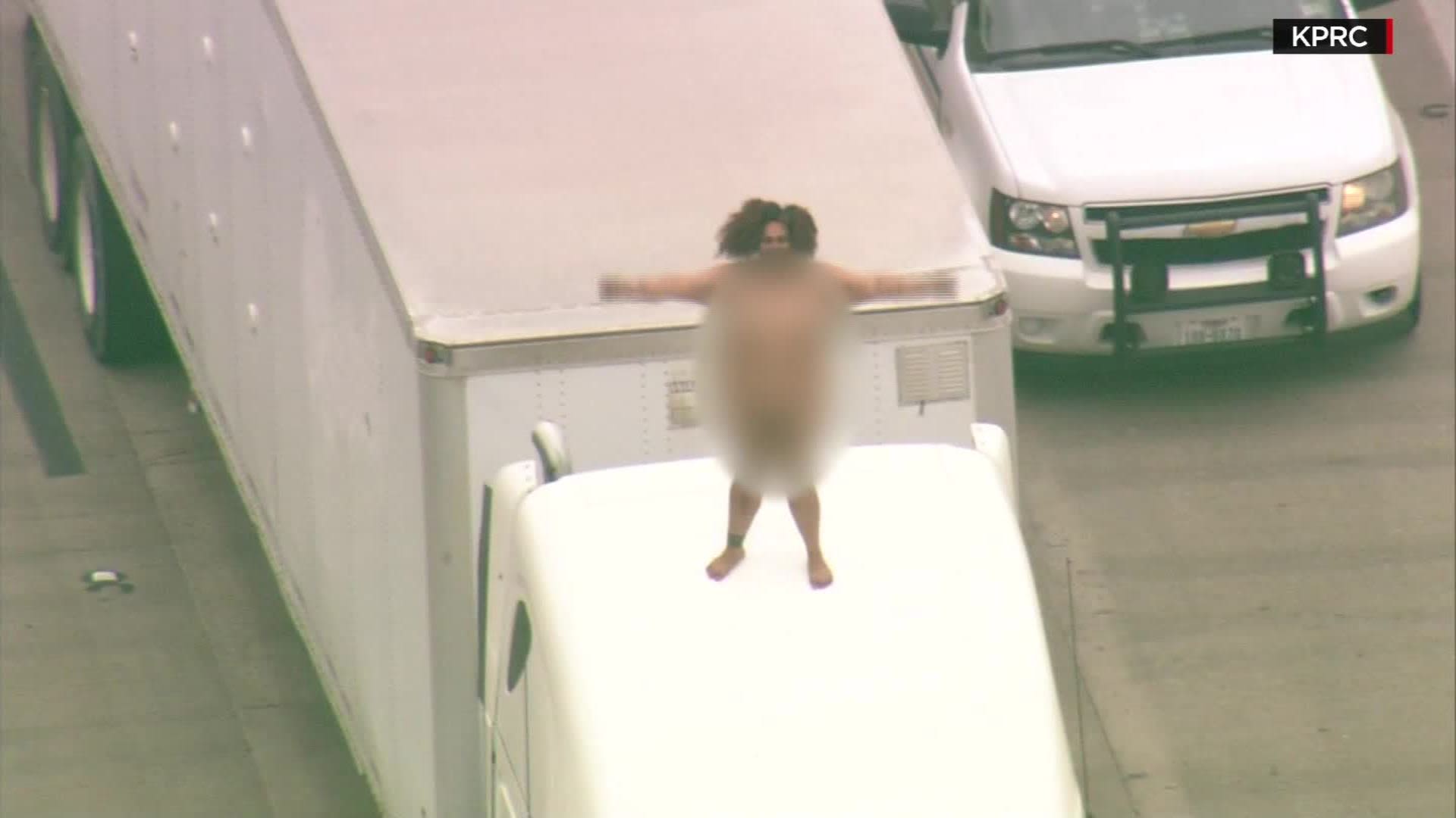 Naked woman causes traffic jam