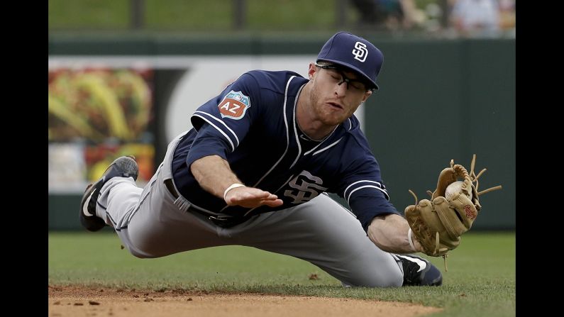 San Diego's Cory Spangenberg fields a ball during a spring-training game in Scottsdale, Arizona, on Saturday, March 5.