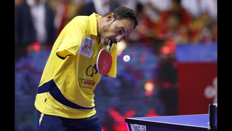 Ibrahim Hamato, a Paralympic table tennis champion from Egypt, returns a shot during an exhibition match in Kuala Lumpur, Malaysia, on Sunday, March 6.
