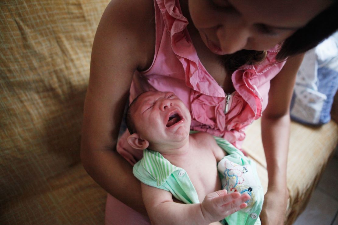 A mother with her 2-month-old son who was born with microcephaly in Recife, Brazil.