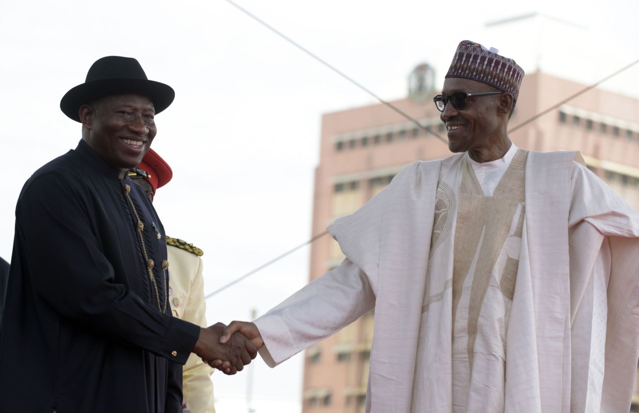 Nigerian President Mohammadu Buhari (R) has committed to continuing with the Nigeria Industrial Revolution Plan (NIRP), started by former President Goodluck Jonathan (L). The Plan aims to scale up the nation's industrial production. 