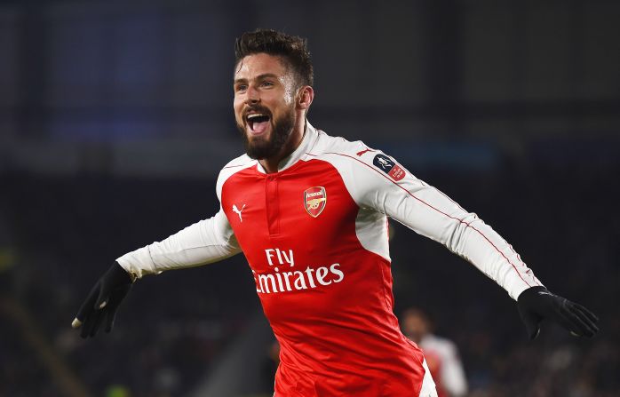 Olivier Giroud of Arsenal celebrates scoring the second Arsenal goal during the Emirates FA Cup Fifth Round Replay match between Hull City and Arsenal at KC Stadium on March 8, 2016. Arsenal advanced to the quarterfinals with a 4-0 victory. 