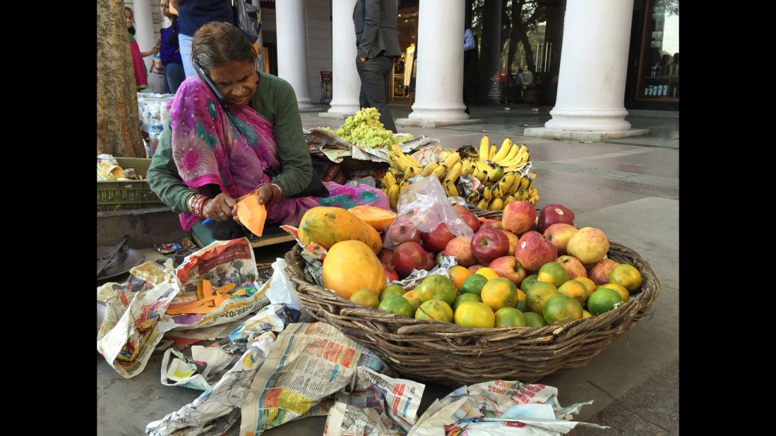 INDIA: "An elderly street vendor in New Delhi is seen talking on a smartphone. Home to a population of almost 1.3 billion people, India is already the world¹s third largest market for smartphones." - CNN's Harmeet Singh <a href="http://instagram.com/harmeetshahsingh" target="_blank" target="_blank">@harmeetshahsingh</a>.