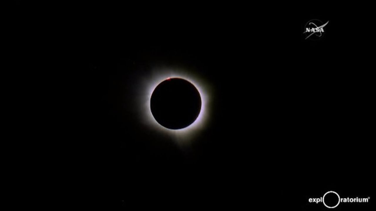 An image released by NASA shows a total solar eclipse seen from Indonesia on Wednesday, March 9, 2016. 
