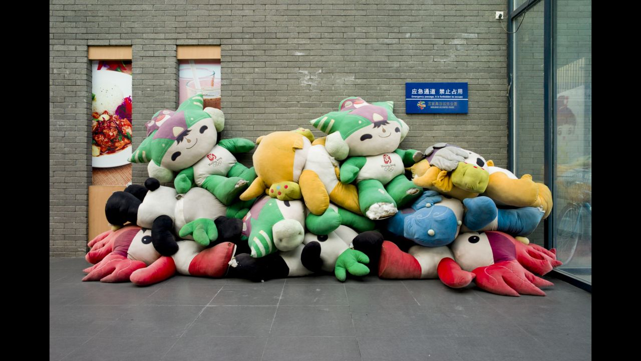 Mascots are piled up at the Olympic Green Park in Beijing. Photographers Jon Pack and Gary Hustwit visited 13 Olympic cities to document the legacy of the Games.