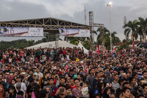 Many rose early to witness the occasion, like this crowd of people in Indonesia. 