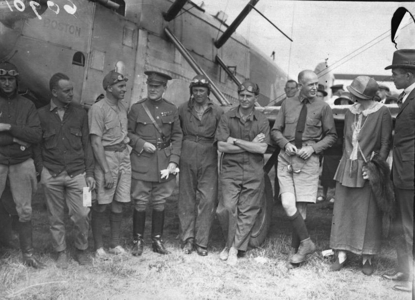 The earliest flight around the world was by two U.S. Army Douglas DWC seaplanes in 1924. The "Chicago" was piloted by Lieutenant Lowell H. Smith (left) and Lieutenant Leslie P. Arnold (second from left), and the "New Orleans" by Lieutenant Erik H. Nelson and Lieutenant John Harding. Their flying time for the 42,398-kilometer trip was 371 hours and 11 minutes.