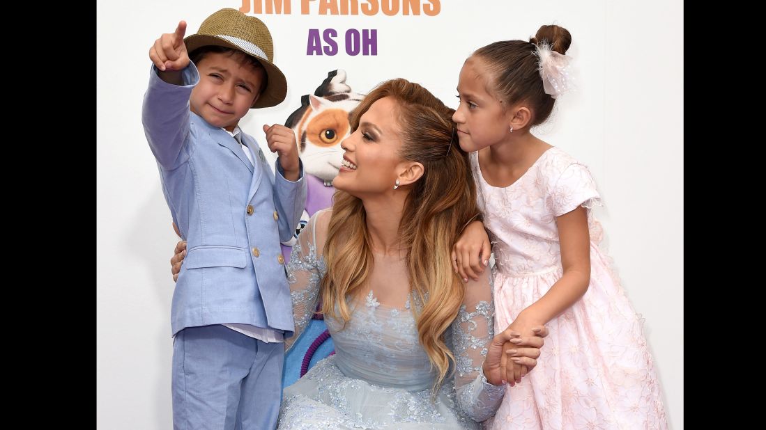 Jennifer Lopez, son Max and daughter Emme attend the premiere of "Home" last year. The singer is proud her twins are bilingual thanks to her nanny who speaks to them in Spanish.