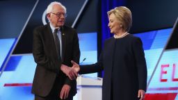 Bernie Sanders and Hillary Clinton shake hands before the Univision News and Washington Post Democratic Presidential Debate on March 9, 2016, in Miami.