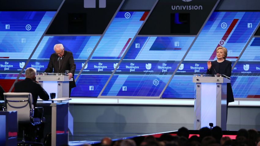 MIAMI, FL - MARCH 09:  Democratic presidential candidate Senator Bernie Sanders (D-VT) and Democratic presidential candidate Hillary Clinton debate during the Univision News and Washington Post Democratic Presidential Primary Debate at the Miami Dade College's Kendall Campus on March 9, 2016 in Miami, Florida. Voters in Florida will go to the polls March 15th for the state's primary.  (Photo by Joe Raedle/Getty Images)