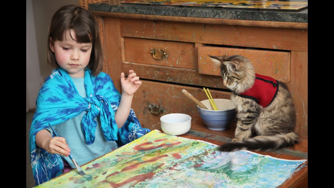 Whenever Iris is painting, which is her favorite activity, Thula is always close by. 