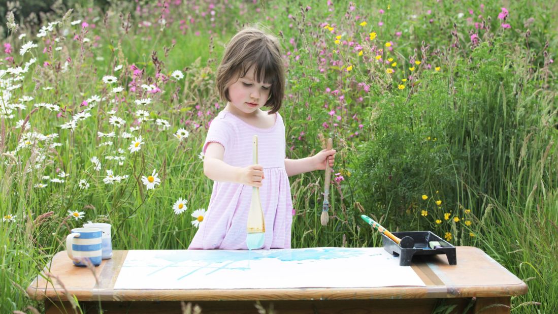 Iris creates her paintings using a variety of brushes and techniques with watercolors, like dabbing, flicking and dotting. 