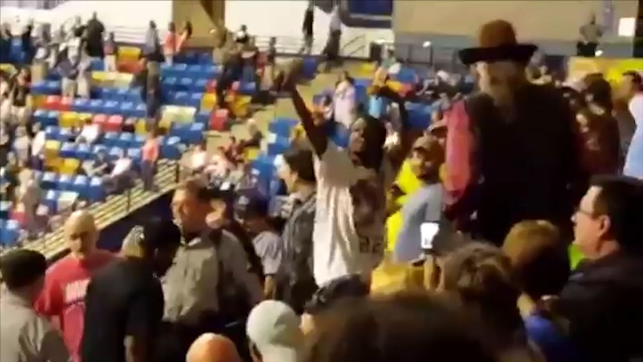 Protester hit Donald Trump rally orig vstop dlewis_00000000.jpg