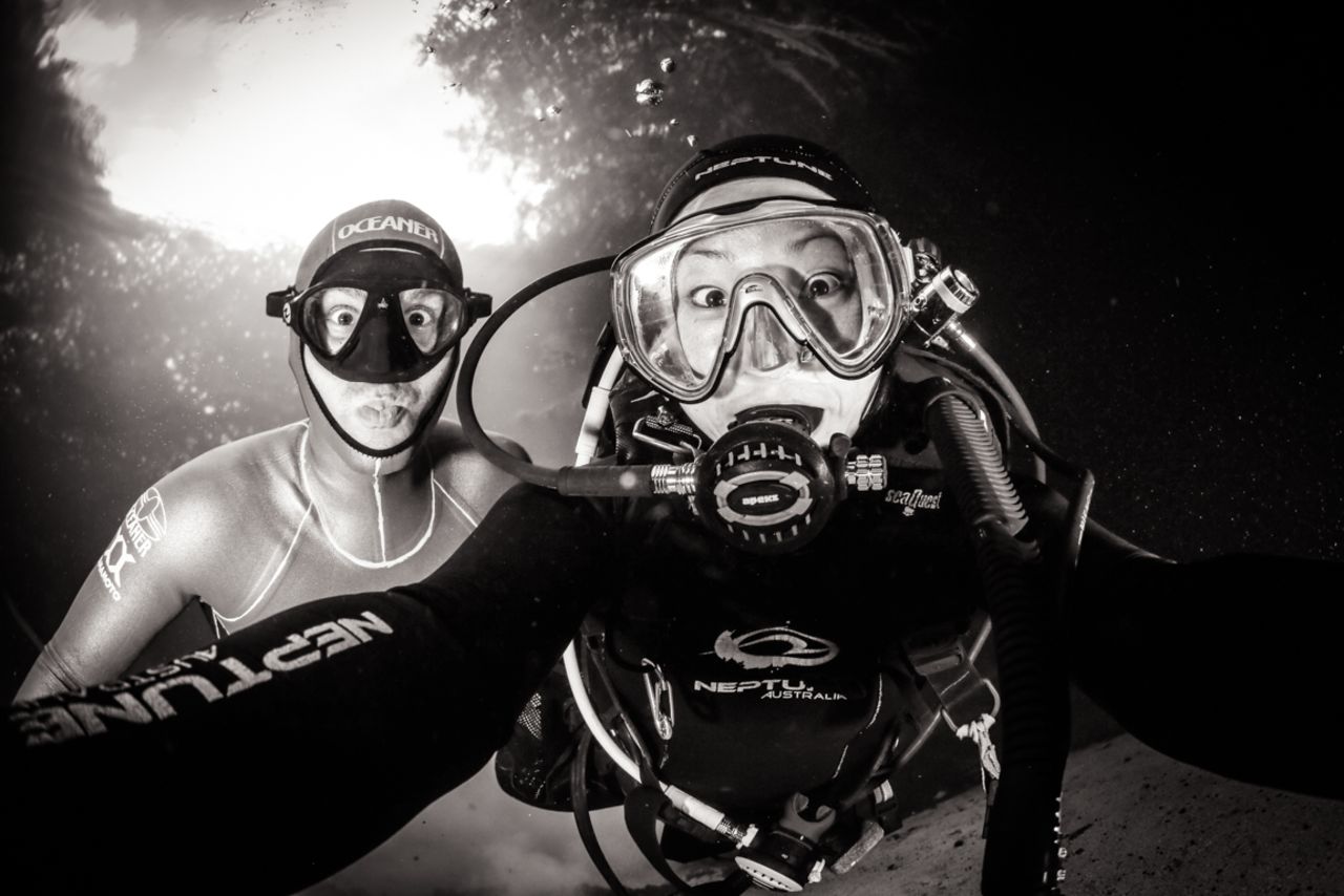 L-R: An underwater selfie with Molchanov and Barrett.<br /><br />