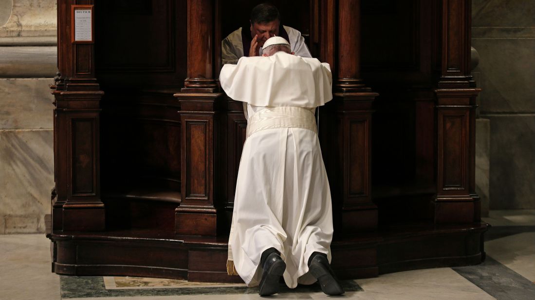 Pope Francis confesses in St. Peter's Basilica during the Vatican's Penitential Celebration on Friday, March 4, 2016.