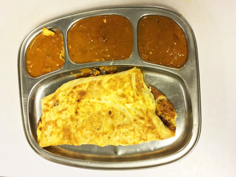 Murtabak -- a pancake stuffed with chicken and onion, served with curry -- is a popular street food in Indonesia.  