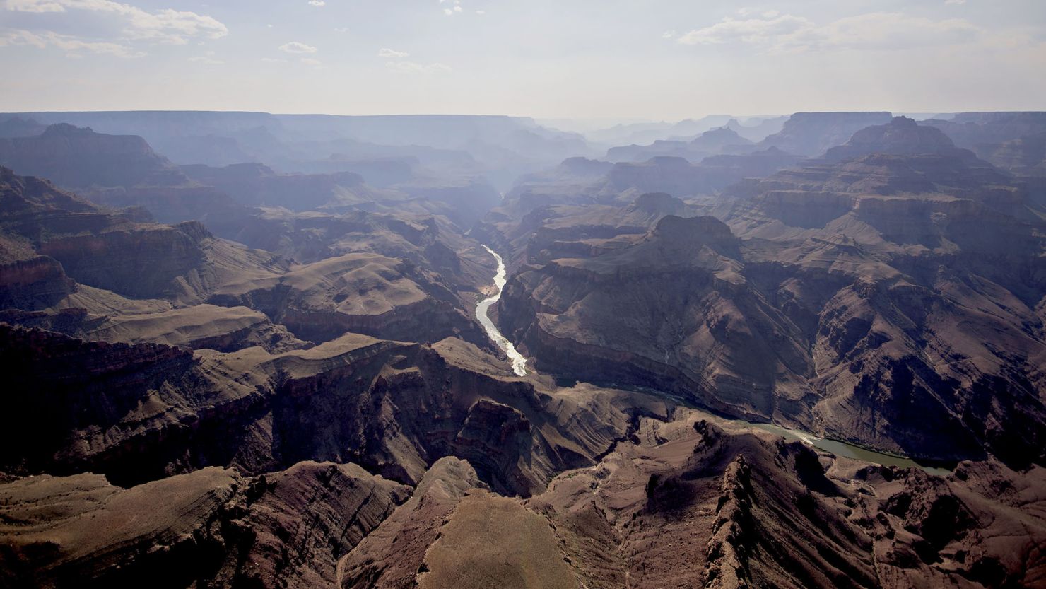The Colorado River runs through Grand Canyon National Park in this aerial photograph taken above Grand Canyon, Arizona.