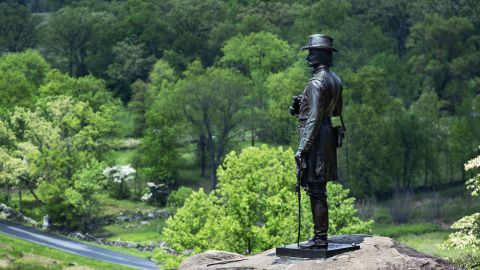 As part of that expansion, Roosevelt moved the War Department's parks and monuments to the National Park Service in 1933. A statue of Civil War Gen. Gouverneur Kemble Warren at Gettysburg National Military Park is shown here. 