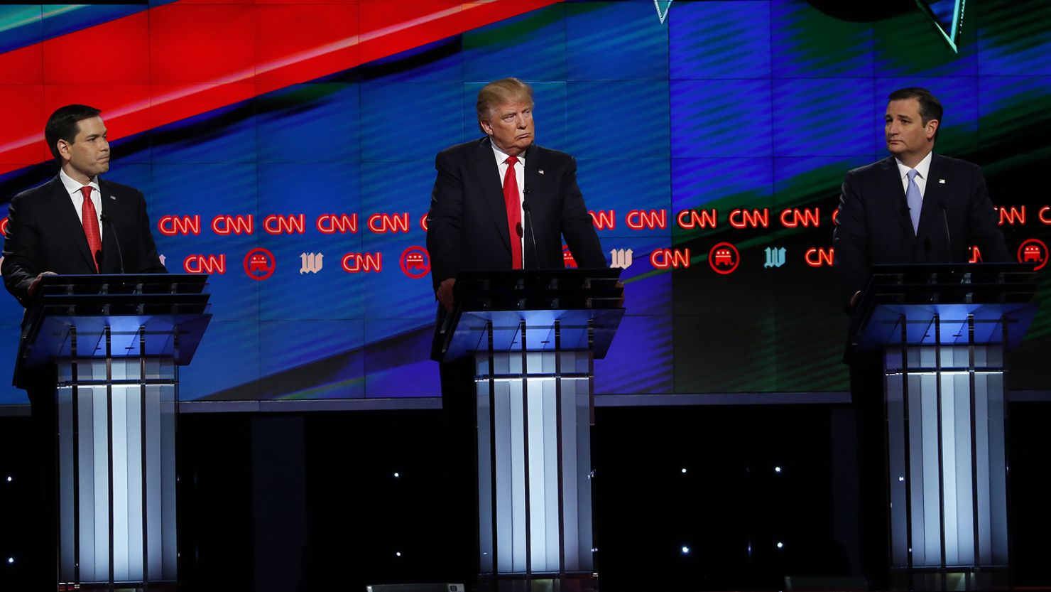 Republican Presidential candidates (L-R) Marco Rubio, Donald Trump and Ted Cruz participate in the CNN Presidential Debate March 10, 2016 in Miami.
