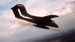 FILE PHOTO: A 21st Tactical Air Support Squadron OV-10 Bronco aircraft fires white phosphorus rockets to mark a target for an air strike during tactical air control training. (Photo by USAF)