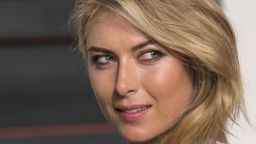 Russian tennis player Maria Sharapova poses as she arrives to the 2016 Vanity Fair Oscar Party in Beverly Hills, California on February 28, 2016. / AFP / ADRIAN SANCHEZ-GONZALEZ        (Photo credit should read ADRIAN SANCHEZ-GONZALEZ/AFP/Getty Images)