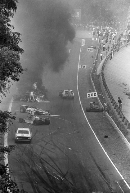 British photographer David Phipps captures the moments of panic and subsequent tragedy as Hunt attempts to pull Swedish driver Ronnie Peterson out from his burning Lotus car at the 1978 Italian Grand Prix. Peterson later died in hospital from a blood clot following an operation on his badly-broken legs. 