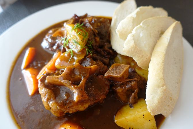 Those slices of baguette come in handy at the end of the meal for mopping up every drop of this hearty oxtail stew. 
