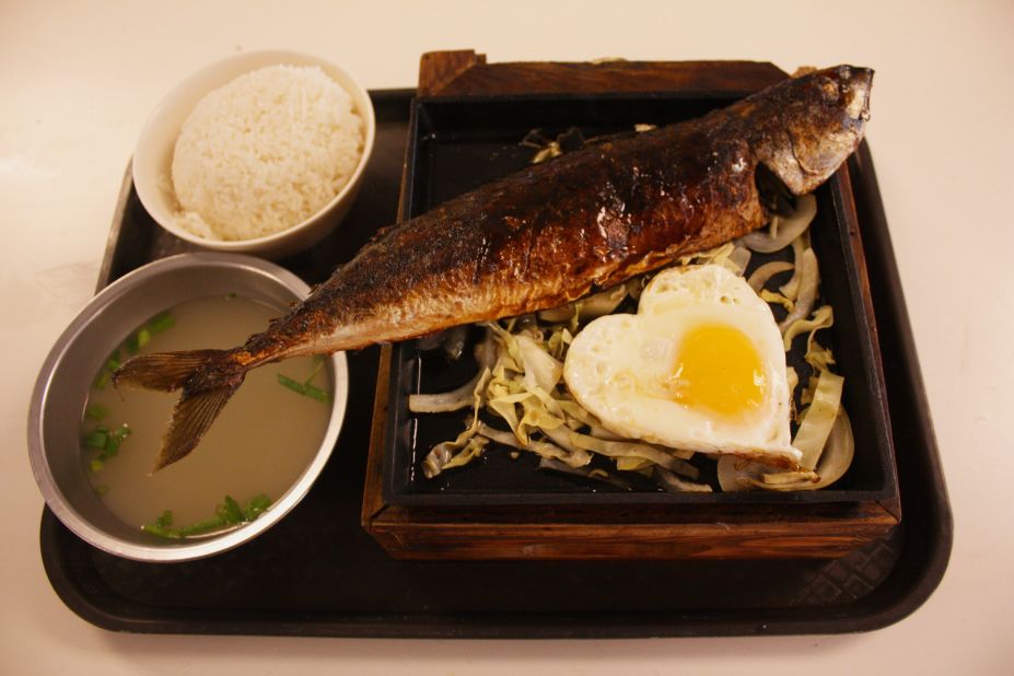 Taiwanese "hot pot" mackerel is sold with the fried egg cut into a cute heart shape.