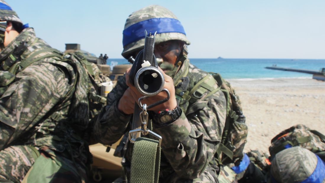 A South Korea marine holds an assault rifle in the March 12 exercises.