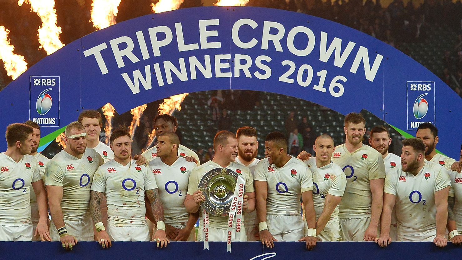 England won its second triple crown in three years and set up a grand slam shot in Paris next week. 