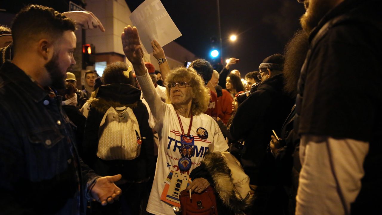 Donald Trump supporter Birgitt Peterson of Yorkville, Illinois, argues with protesters outside the UIC Pavilion after the canceled rally for the Republican presidential candidate in Chicago on Friday, March 11. <a href="http://www.chicagotribune.com/news/ct-birgitt-peterson-trump-rally-met-0313-20160312-story.html" target="_blank" target="_blank">Peterson told the Chicago Tribune</a> that she responded with the Nazi-style salute after anti-Trump protestors called her a Nazi. <a href="http://www.cnn.com/2016/03/12/politics/donald-trump-protests/index.html" target="_blank">The Trump rally was canceled</a> because of concerns after hundreds of protestors packed into the University of Illinois at Chicago venue.