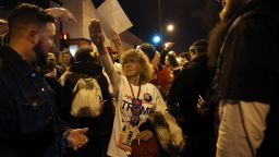 Donald Trump supporter Birgitt Peterson of Yorkville, Ill., argues with protesters outside the UIC Pavilion after the cancelled rally for the Republican presidential candidate in Chicago on Friday, March 11, 2016. (Photo by E. Jason Wambsgans/Chicago Tribune/TNS) *** Please Use Credit from Credit Field ***