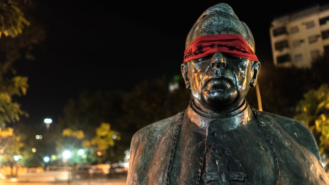 The artist behind the blindfolds says they act as a way to shield the eyes of those who cannot do anything to change the country. All others, he says, have the ability to do something to change the "shameful" state the country is in.