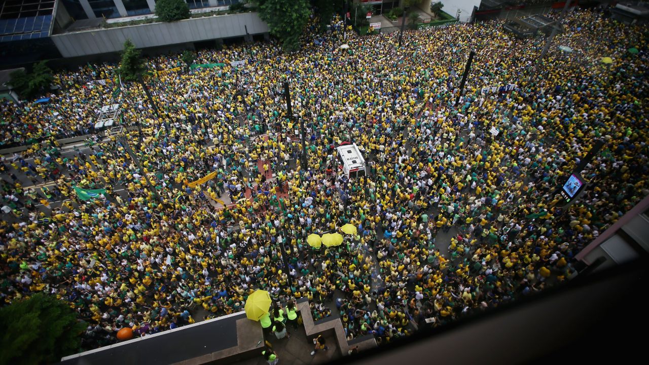 Anti-government protestors flood Sao Paulo's streets Sunday.