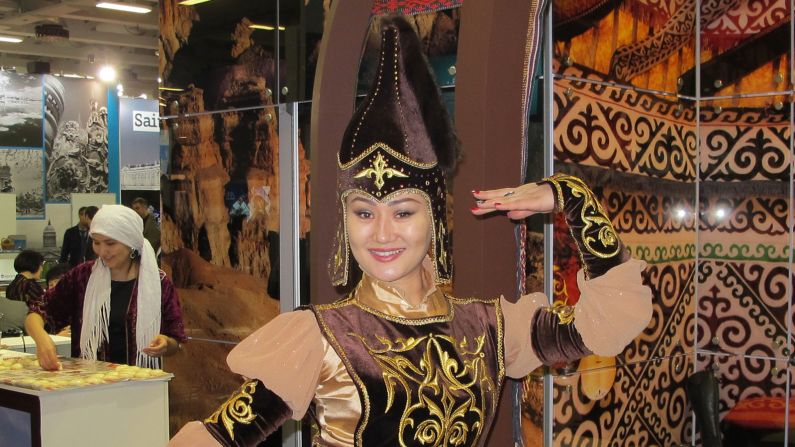 Kazakhstan sent this woman to promote her country. It also sent a delicious doughnut stand.