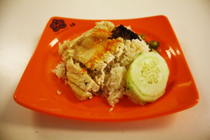 Hainanese chicken with rice and cucumber is considered a national dish of Singapore.