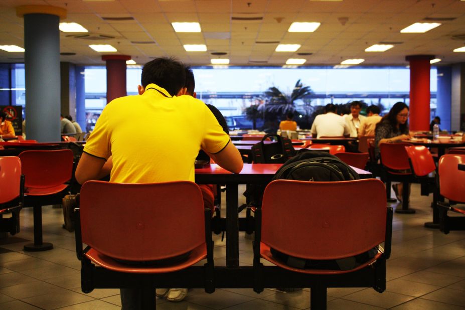 A worker enjoys lunch in the staff canteen at Terminal 2.