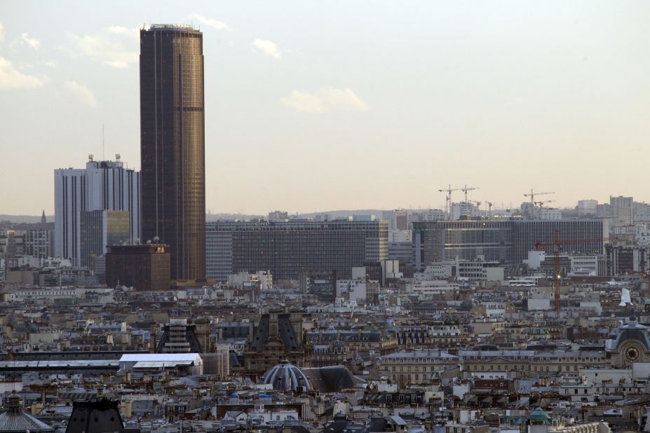 The monolithic Tour Montparnasse, an office skyscraper in the 15th arrondissement of Paris, is as imposing today as when it was completed in 1973. Six hundred and eighty nine feet tall, it was the highest building in the French capital until 2011.